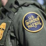 Border Patrol agent charged with choking detainee